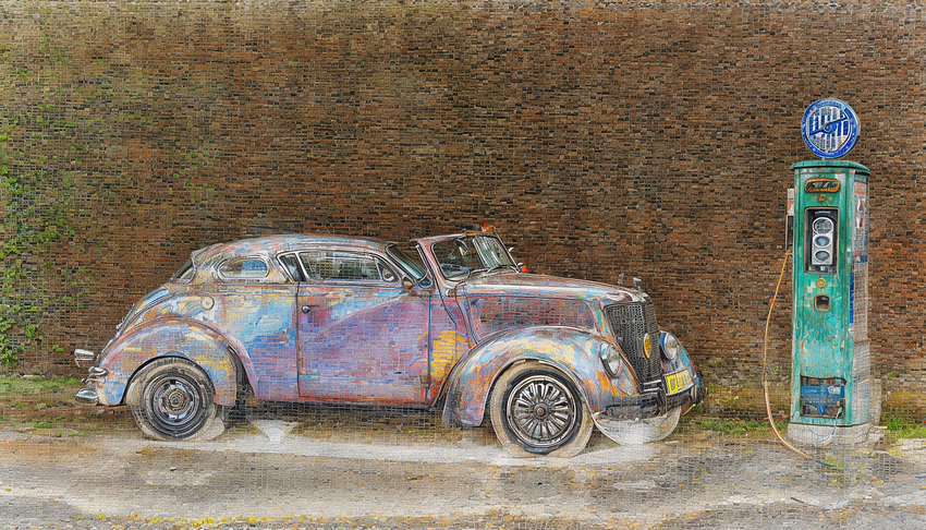 New-1ab-halftone-gigapixel-redefine-5500-1080h-A car parked at a petrol pump